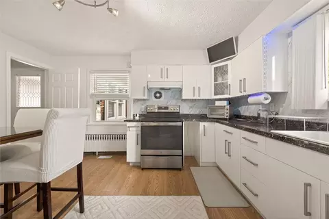 Kitchen - 126 Wildmere Rd, Irondequoit, NY 14617 photo 3 of 4