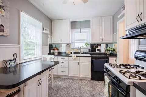 Kitchen - 367 Walzer Rd, Irondequoit, NY 14622 photo 5 of 6