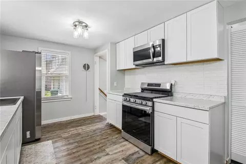 Kitchen - 60 Walzer Rd, Irondequoit, NY 14622 photo 3 of 6