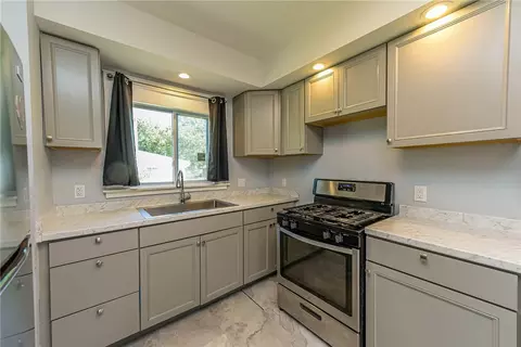 Kitchen - 32 Walzer Rd, Irondequoit, NY 14622 photo 3 of 6