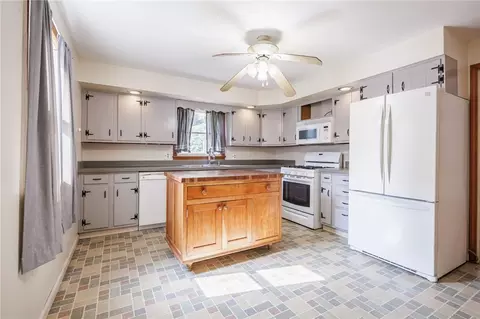 Kitchen - 79 Bellehurst Dr, Irondequoit, NY 14617 photo 3 of 7