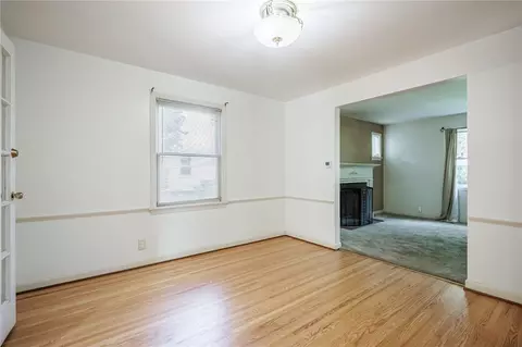 Living - 79 Bellehurst Dr, Irondequoit, NY 14617 photo 4 of 8