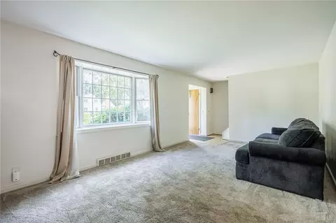 Living - 79 Bellehurst Dr, Irondequoit, NY 14617 photo 1 of 8