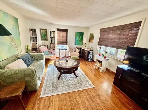 Living - 87 E 2nd St, Corning, NY 14830 photo 2 of 3