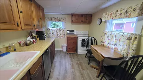Kitchen - 809 Farleys Point Rd, Springport, NY 13160 photo 1 of 2