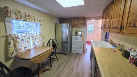 Kitchen - 809 Farleys Point Rd, Springport, NY 13160 photo 2 of 2