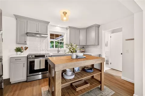 Kitchen - 430 Cooper Rd, Irondequoit, NY 14617 photo 3 of 7