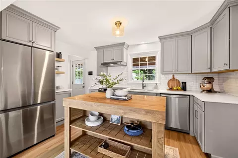 Kitchen - 430 Cooper Rd, Irondequoit, NY 14617 photo 1 of 7