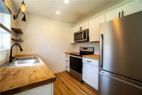 Kitchen - 55 Seacliffe Rd, Irondequoit, NY 14622 photo 2 of 3