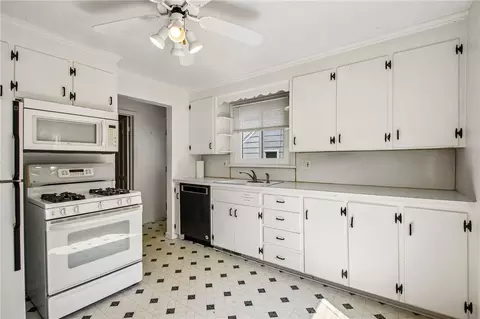 Kitchen - 65 Crestfield Dr, Irondequoit, NY 14617 photo 2 of 3