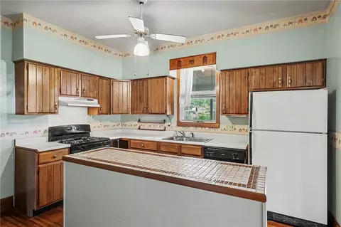 Kitchen - 3664 Culver Rd, Irondequoit, NY 14622 photo 3 of 3