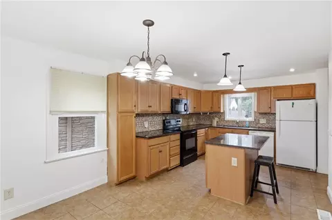 Kitchen - 21 Fairlea Dr, Irondequoit, NY 14622 photo 2 of 5