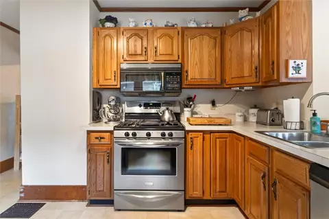 Kitchen - 3948 Culver Rd, Irondequoit, NY 14622 photo 4 of 4