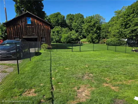 Exterior - 207 E William St, Bath, NY 14810 photo 9 of 12