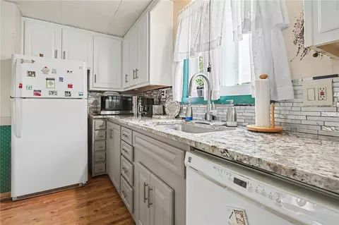 Kitchen - 3275 Culver Rd, Irondequoit, NY 14622 photo 2 of 2