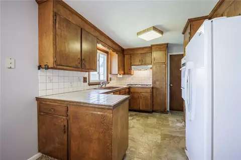 Kitchen - 90 Oakbend Ln, Irondequoit, NY 14617 photo 1 of 4