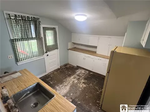 Kitchen - 110 E 6th St, Jamestown, NY 14701 photo 2 of 4