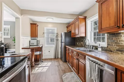 Kitchen - 33 Coolidge Rd, Irondequoit, NY 14622 photo 2 of 4
