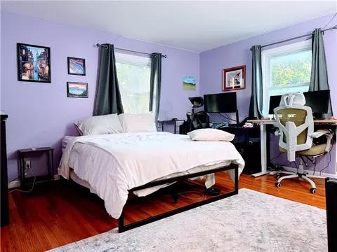 Bedroom - 101 E Buffalo St, Riga, NY 14428 photo 1 of 2