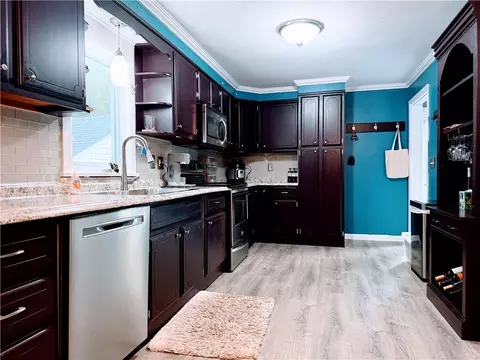 Kitchen - 101 E Buffalo St, Riga, NY 14428 photo 2 of 3