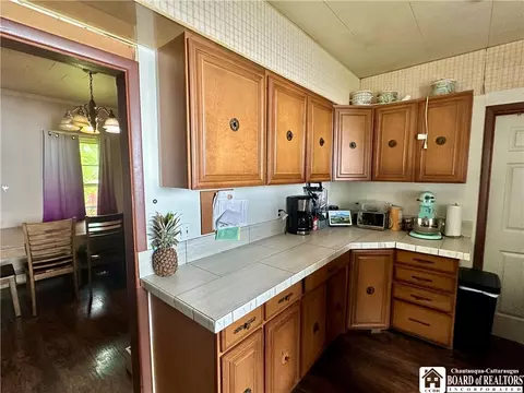 Kitchen - 149 Beech St, Persia, NY 14070 photo 2 of 2