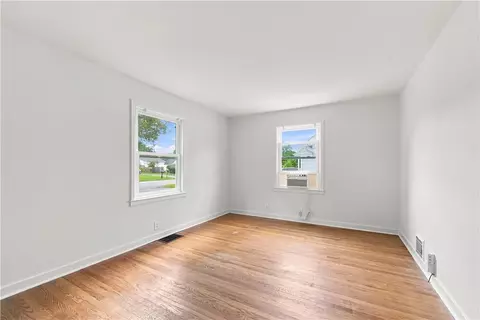 Living - 1061 Whitlock Rd, Irondequoit, NY 14609 photo 2 of 3