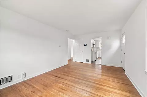 Living - 1061 Whitlock Rd, Irondequoit, NY 14609 photo 3 of 3