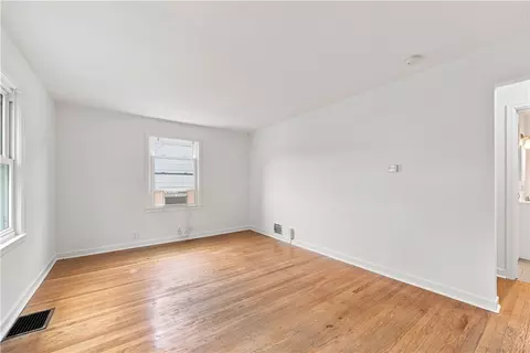 Living - 1061 Whitlock Rd, Irondequoit, NY 14609 photo 1 of 3
