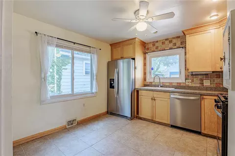 Kitchen - 84 Harwick Rd, Irondequoit, NY 14609 photo 2 of 3