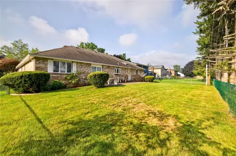 Exterior - 100 Kearney Dr, Irondequoit, NY 14617 photo 5 of 8