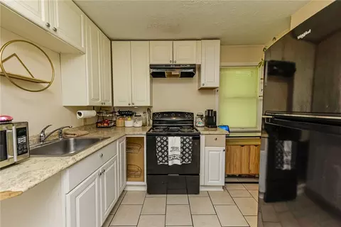 Kitchen - 140 Taft Ave, Irondequoit, NY 14609 photo 2 of 3
