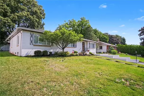 Exterior - 60 Longcroft Rd, Irondequoit, NY 14609 photo 2 of 11
