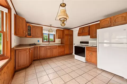 Kitchen - 1070 Shoemaker Rd, Webster, NY 14580 photo 2 of 2