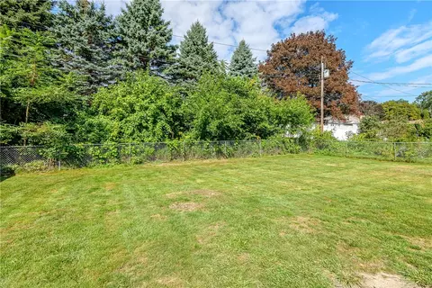Exterior - 25 Dorington Rd, Irondequoit, NY 14609 photo 7 of 10