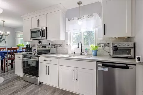 Kitchen - 25 Dorington Rd, Irondequoit, NY 14609 photo 3 of 4