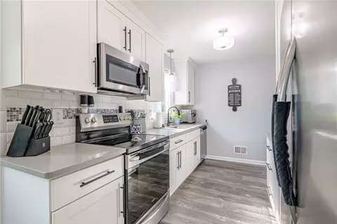 Kitchen - 25 Dorington Rd, Irondequoit, NY 14609 photo 2 of 4