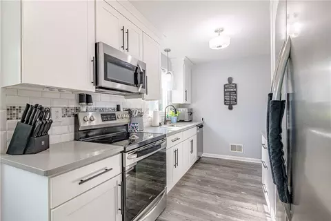 Kitchen - 25 Dorington Rd, Irondequoit, NY 14609 photo 2 of 4