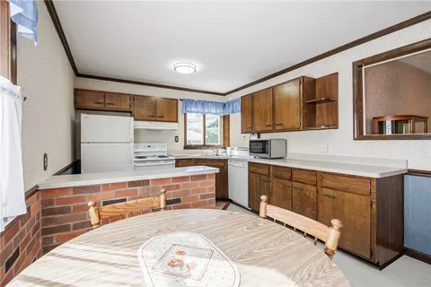 Kitchen - 303 Somershire Dr, Irondequoit, NY 14617 photo 2 of 2