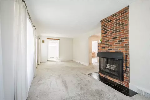Living - 303 Somershire Dr, Irondequoit, NY 14617 photo 2 of 3