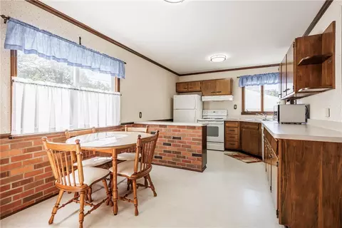 Kitchen - 303 Somershire Dr, Irondequoit, NY 14617 photo 1 of 2