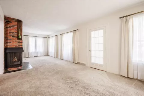 Living - 303 Somershire Dr, Irondequoit, NY 14617 photo 1 of 3