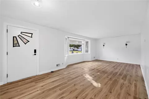 Living - 75 Astronaut Dr, Irondequoit, NY 14609 photo 2 of 4