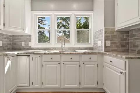 Kitchen - 67 Harwick Rd, Irondequoit, NY 14609 photo 2 of 3