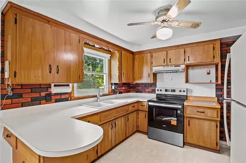 Kitchen - 135 Dierdre Dr, Irondequoit, NY 14617 photo 2 of 3