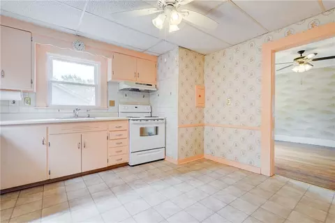 Kitchen - 151 Hurstbourne Rd, Irondequoit, NY 14609 photo 2 of 4