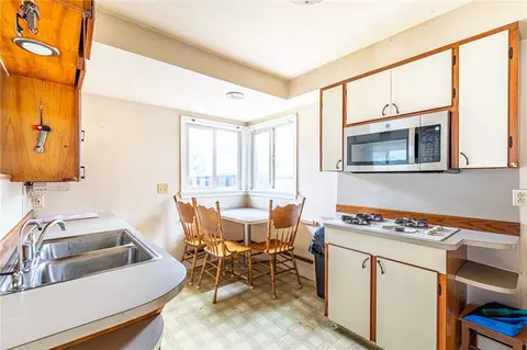 Kitchen - 909 Whitlock Rd, Irondequoit, NY 14609 photo 1 of 2