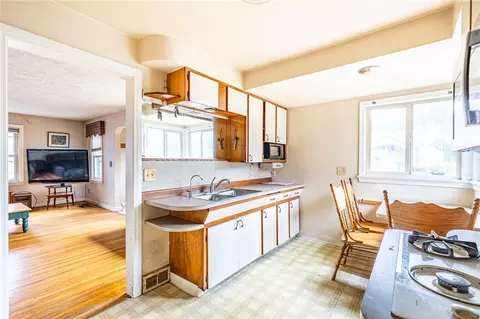 Kitchen - 909 Whitlock Rd, Irondequoit, NY 14609 photo 2 of 2