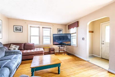 Living - 909 Whitlock Rd, Irondequoit, NY 14609 photo 2 of 3
