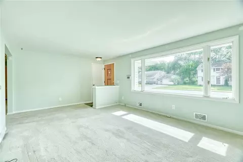 Living - 82 Woolacott Rd, Irondequoit, NY 14617 photo 2 of 4