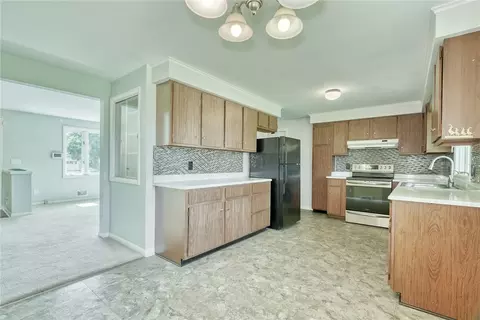 Kitchen - 82 Woolacott Rd, Irondequoit, NY 14617 photo 1 of 6
